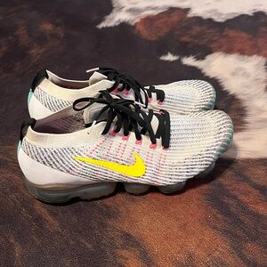 Nike Flyknit Sneakers with Yellow Swoosh